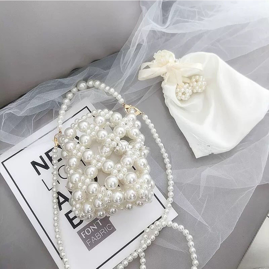 Ví Cầm Tay Và Vòng Tay Ngọc Tr - đánh giá và giá Coin Purse Women